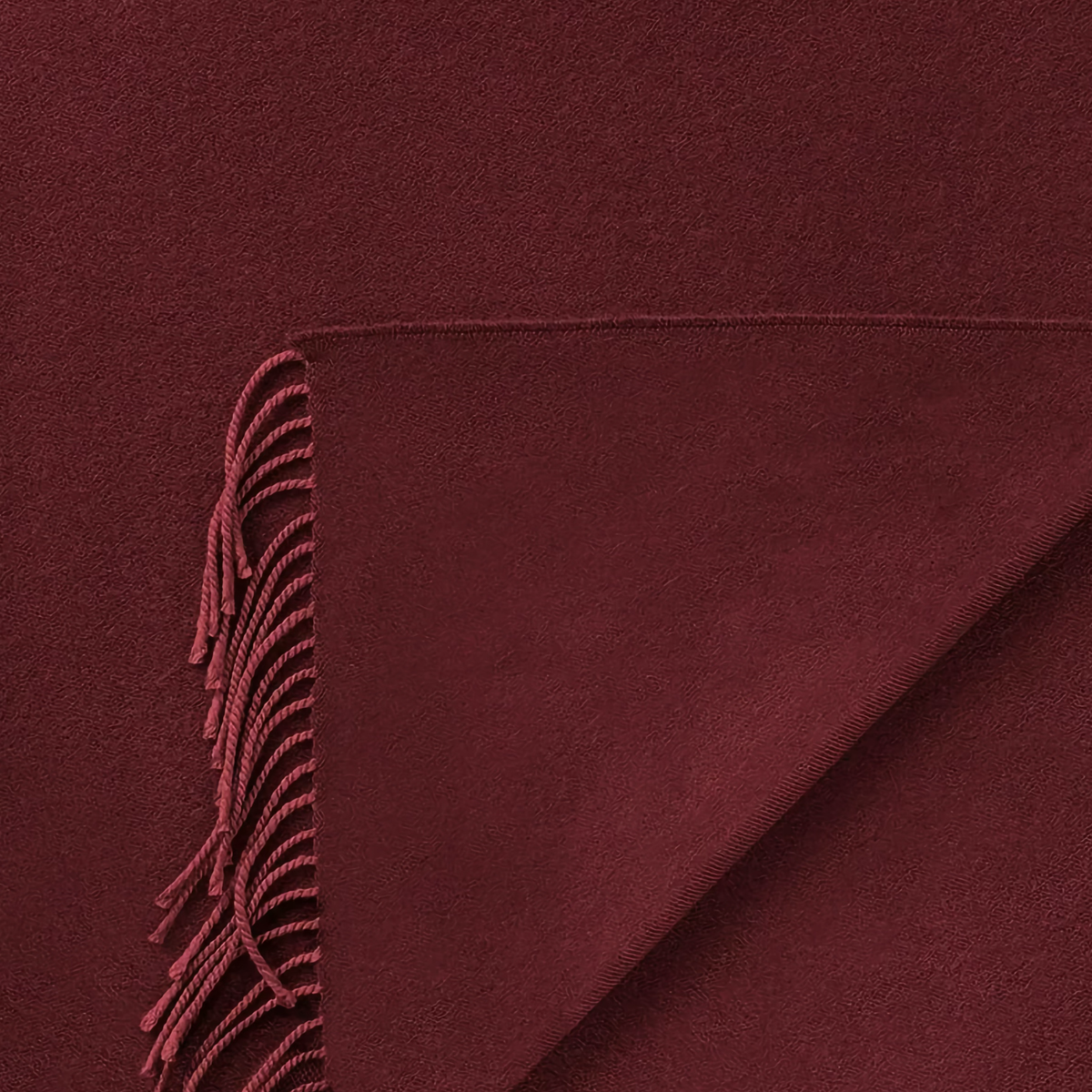 Closeup of Scandia Home Fringe Throw in Claret Color