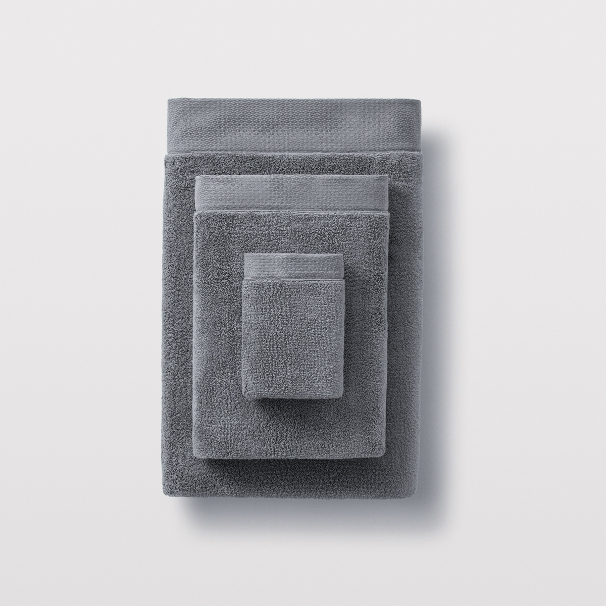 Stack of Alloy color Scandia Home Cosima Towels