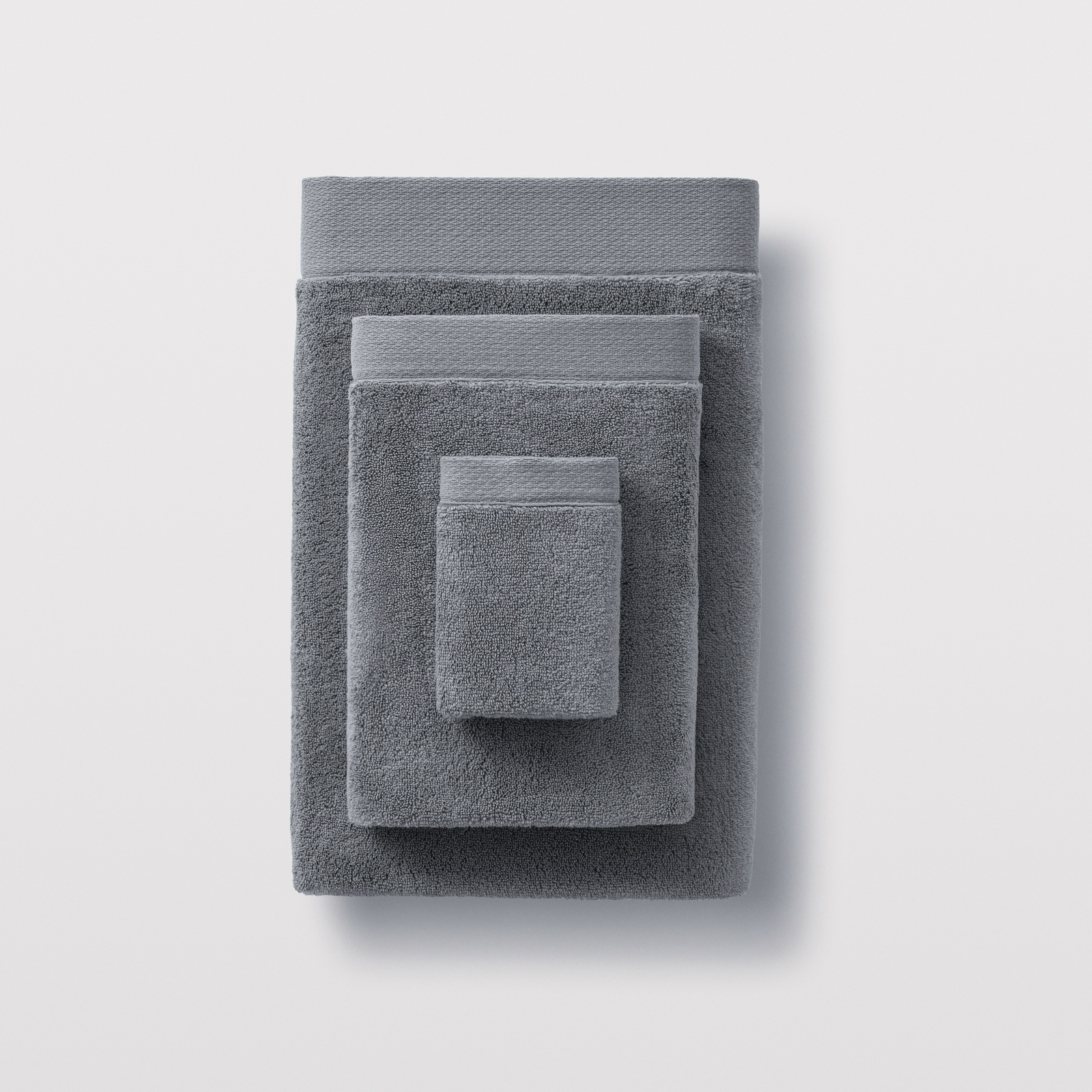 Stack of Alloy color Scandia Home Cosima Towels