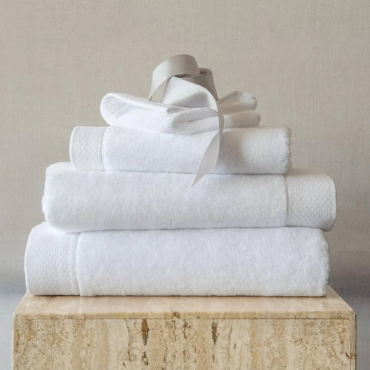 Stack of White Scandia Home Cosima Towels