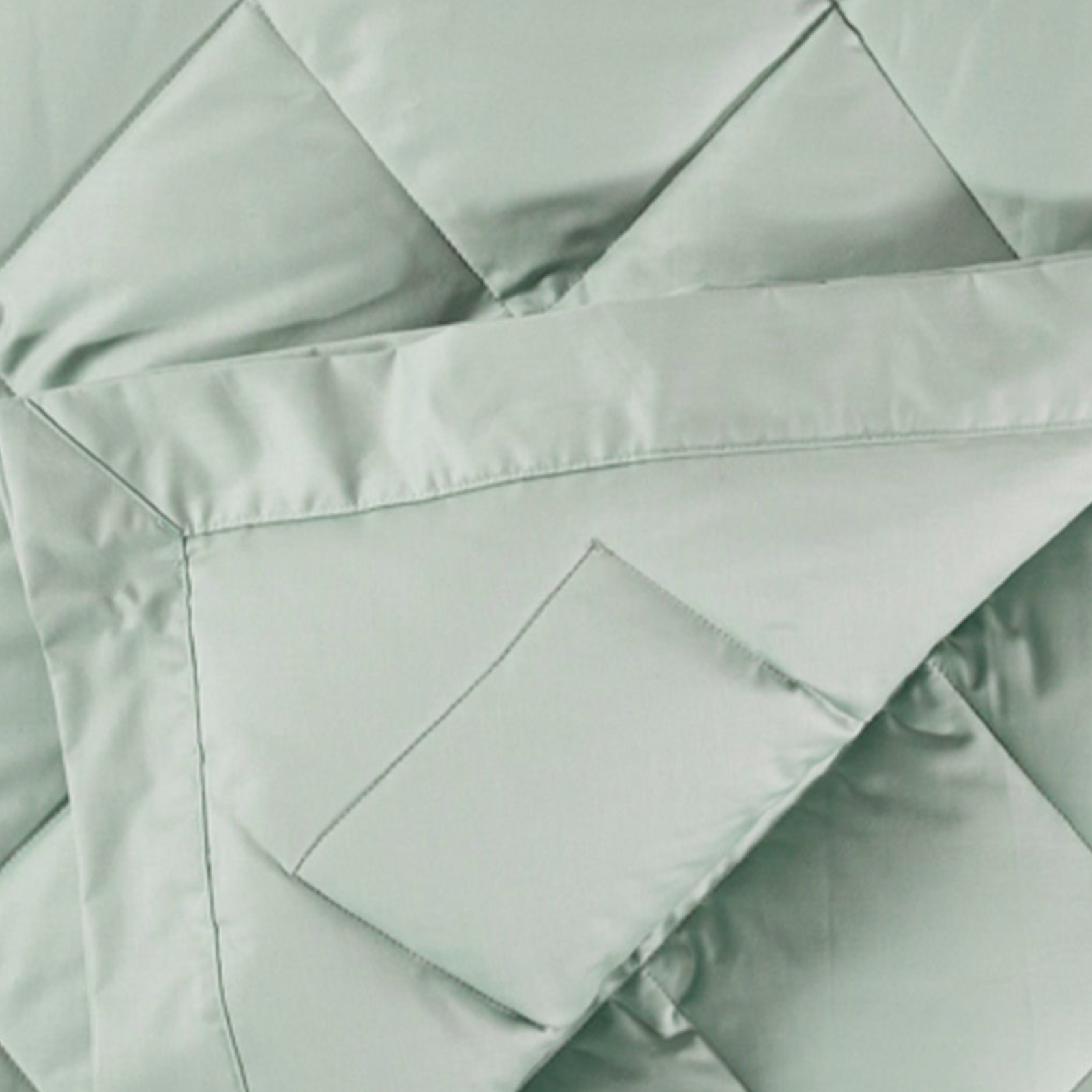 Folded View of Scandia Home Diamond Quilted Down Blankets in Heath Color