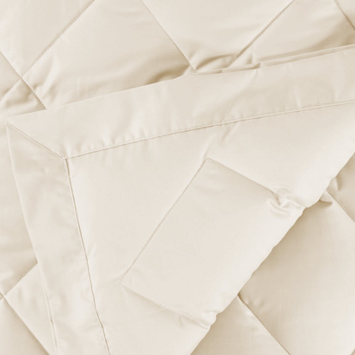 Closeup View of Scandia Home Diamond Quilted Down Blanket in Ivory Color