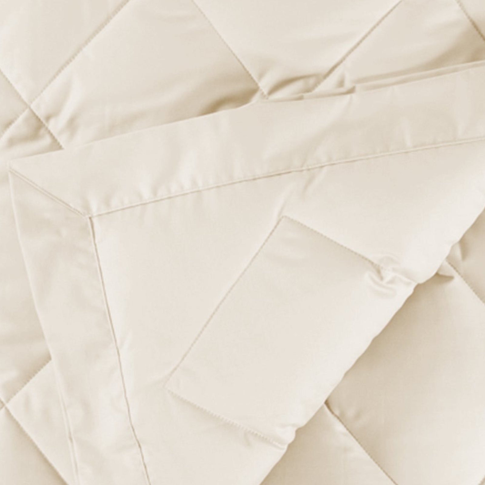 Folded View of Scandia Home Diamond Quilted Down Blankets in Ivory Color