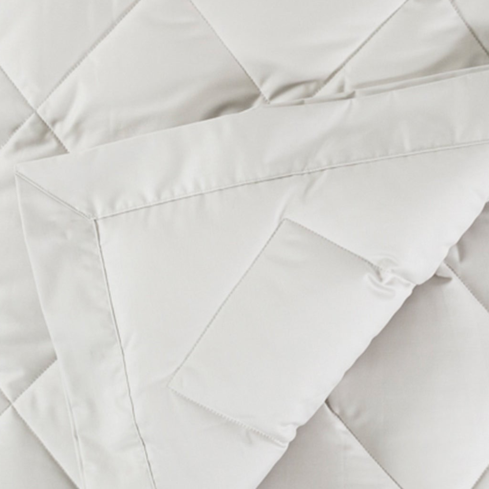 Folded View of Scandia Home Diamond Quilted Down Blankets in Shadow Color