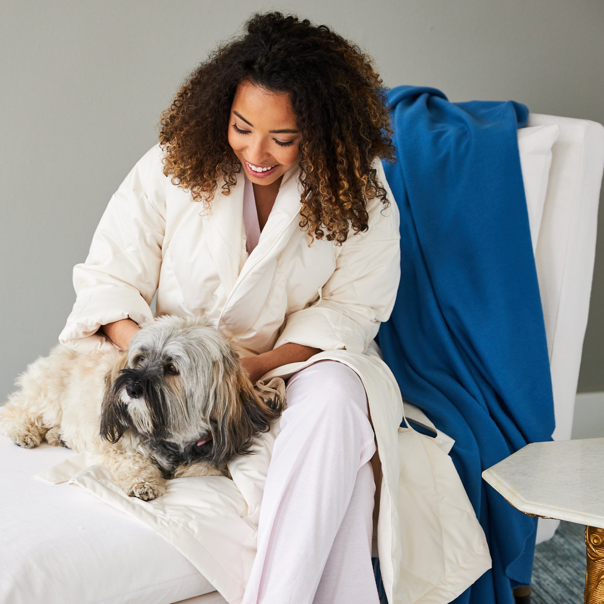 Woman with a Dog Wearing a Scandia Home Down Robe