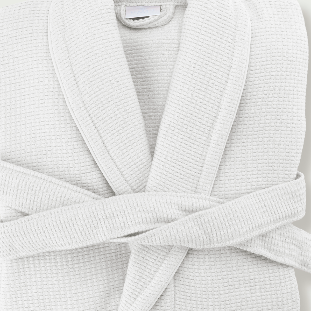 Closeup of Folded White Scandia Home Grotto Robe