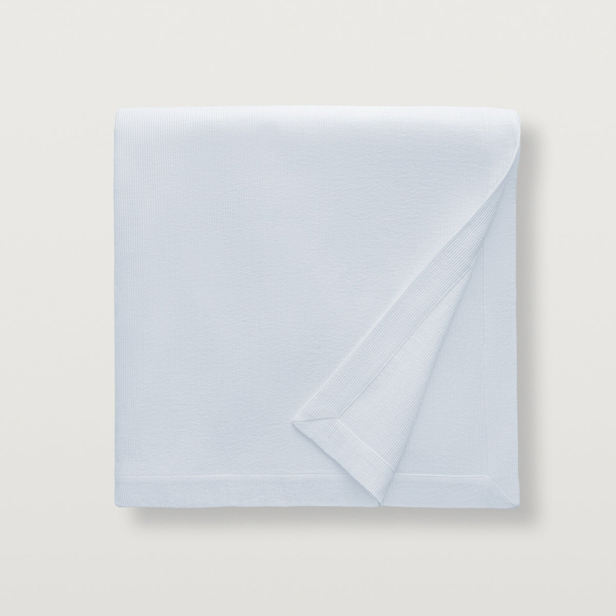 Folded Scandia Home Lorenzo Pique Coverlet in Platinum color