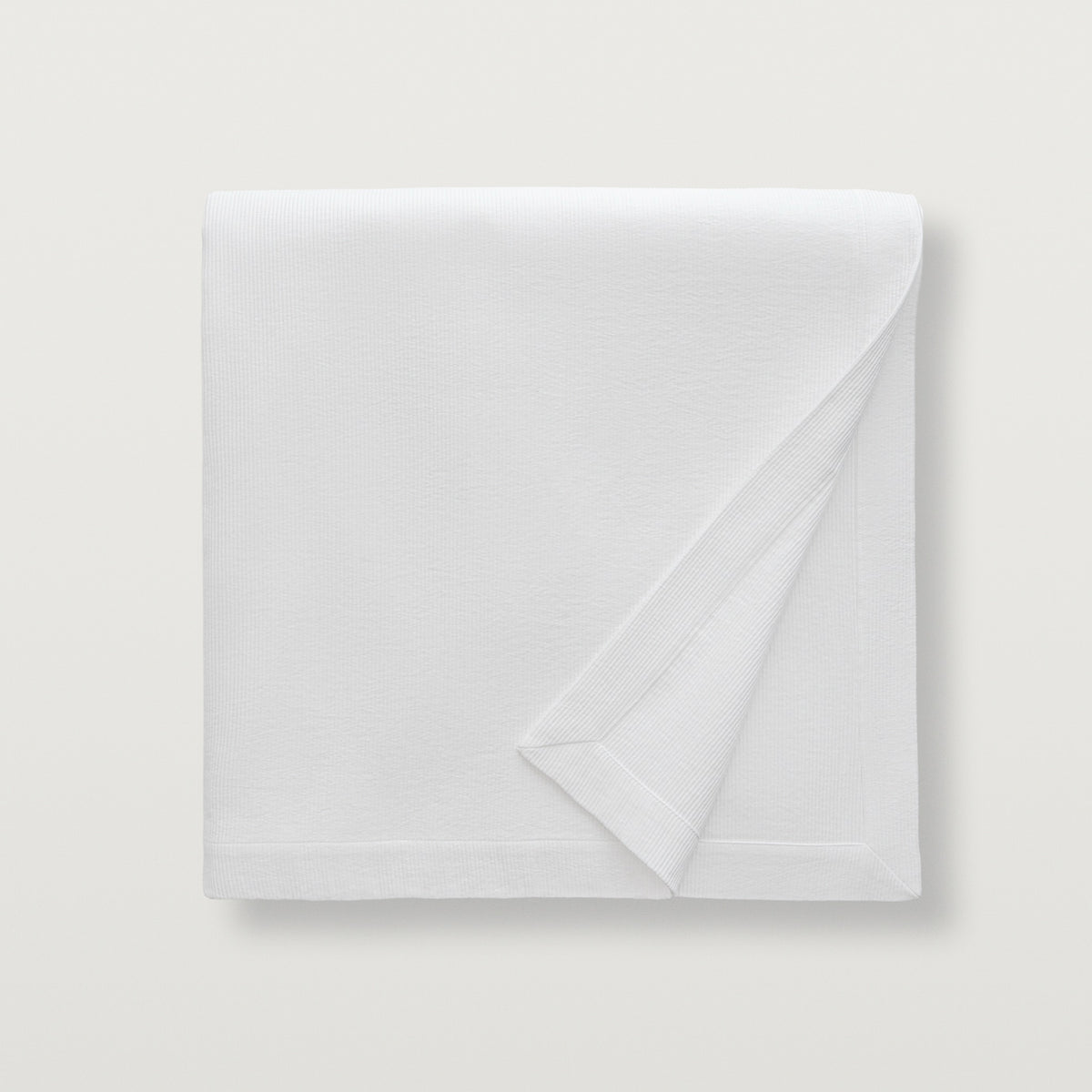 Folded Scandia Home Lorenzo Pique Coverlet in Pure White color