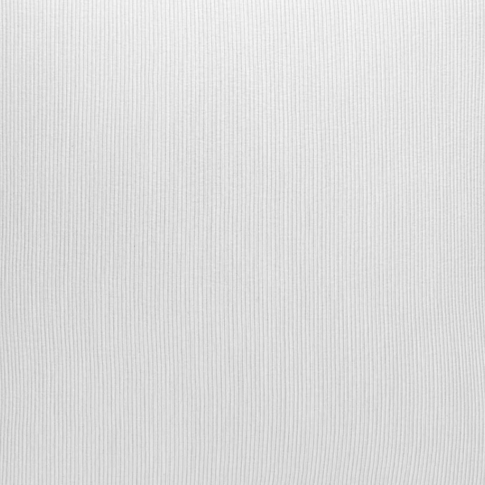 Stack of Scandia Home Lorenzo Pique Shams on a marble surface with a window view of mountains.