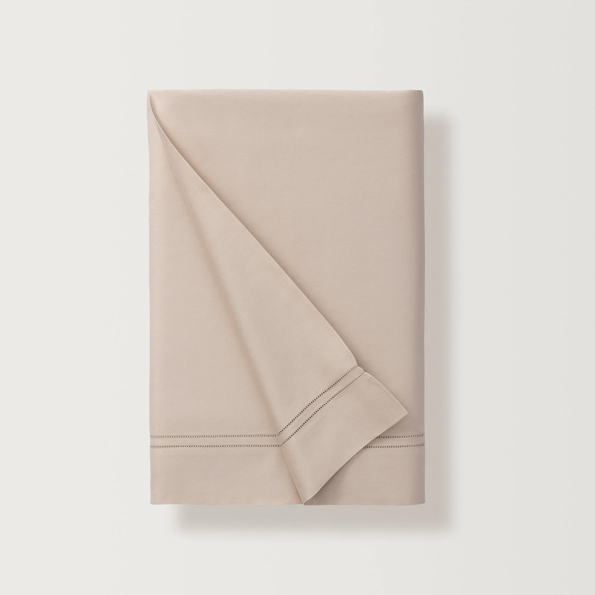 Folded Flat Sheet of Fawn Color Scandia Home Lucea Sea Island Collection