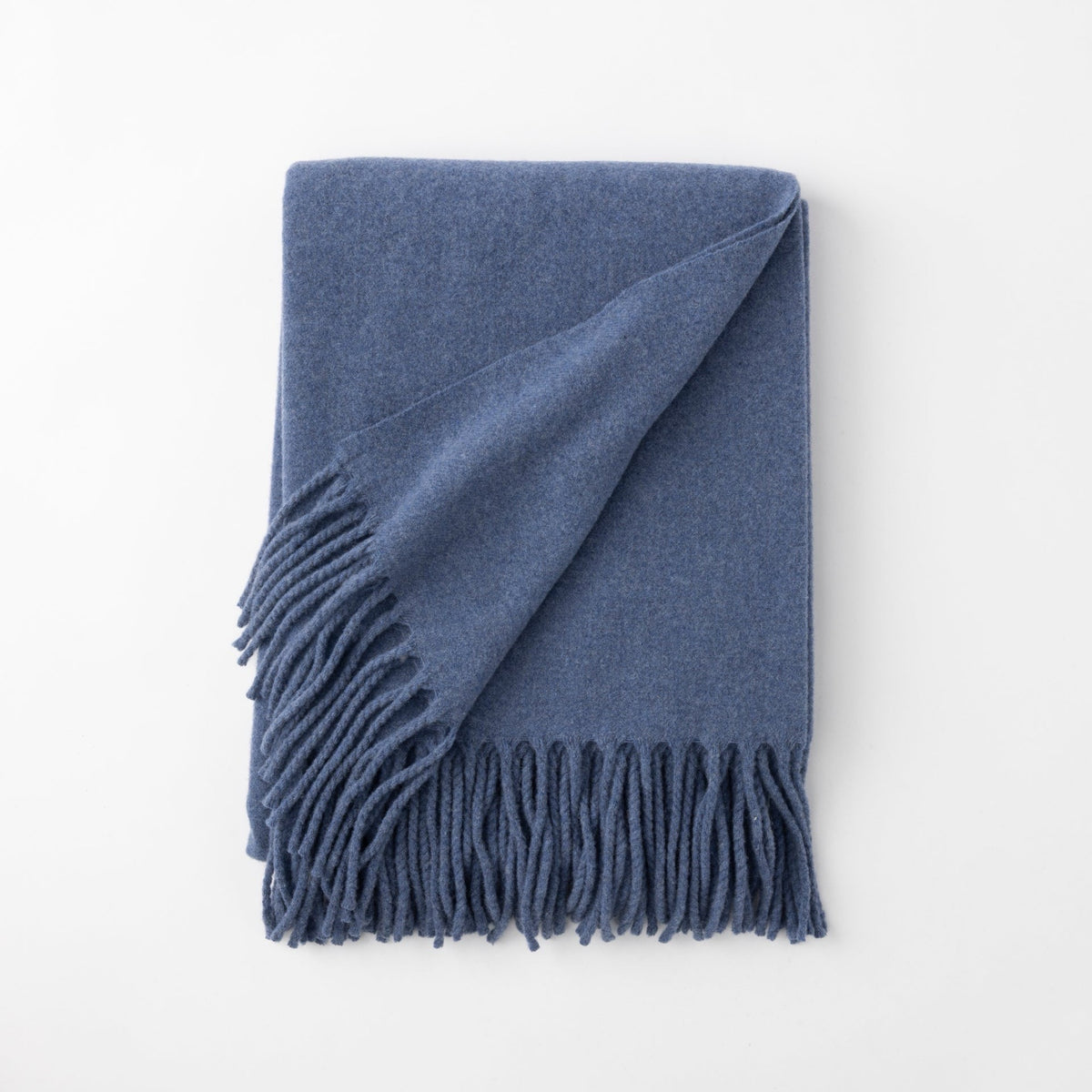 Folded Scandia Home Pietro Throw in Lake Blue color 