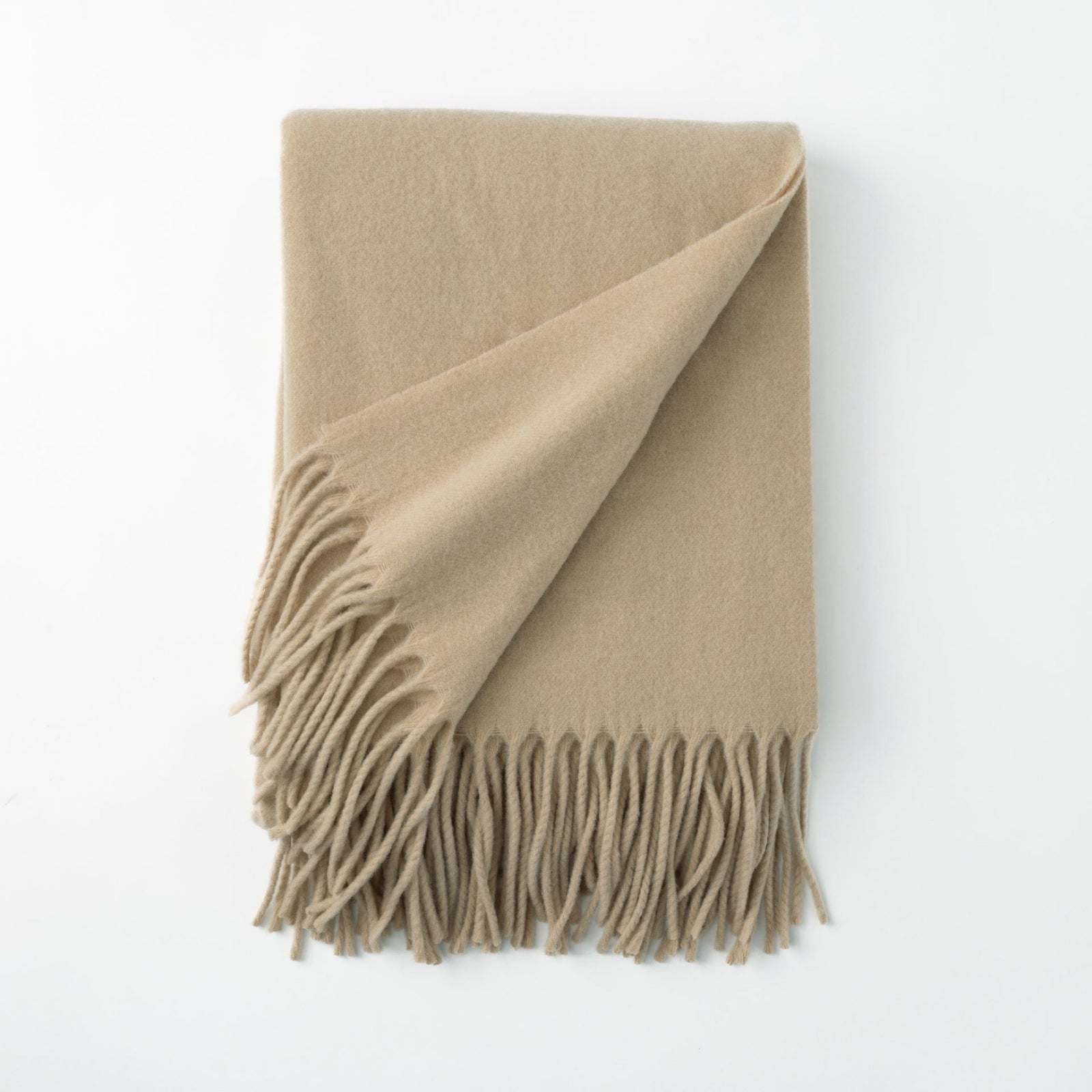 Folded Scandia Home Pietro Throw in Nougat color 