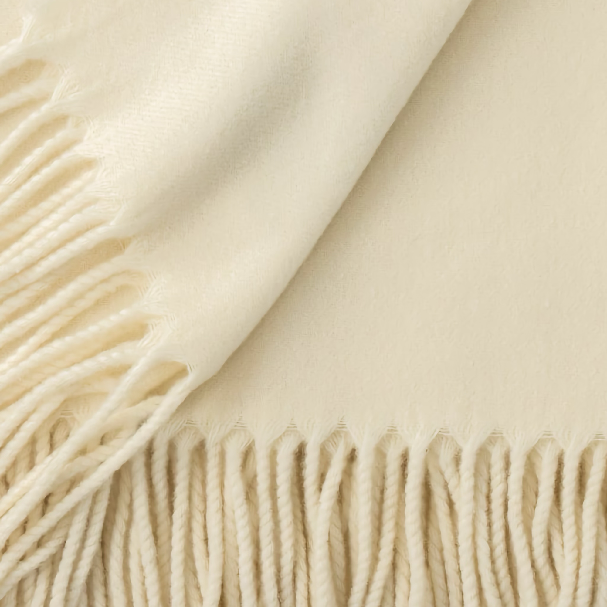 Collection of Scandia Home Pietro Throws with fringes