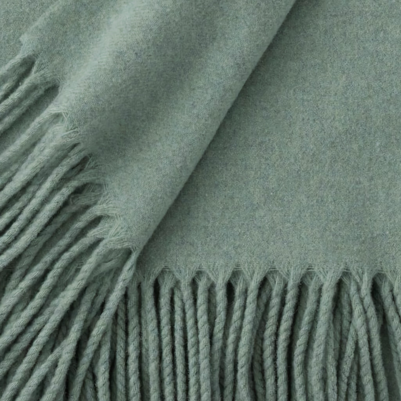 Folded Scandia Home Pietro Throw in Lichen color 