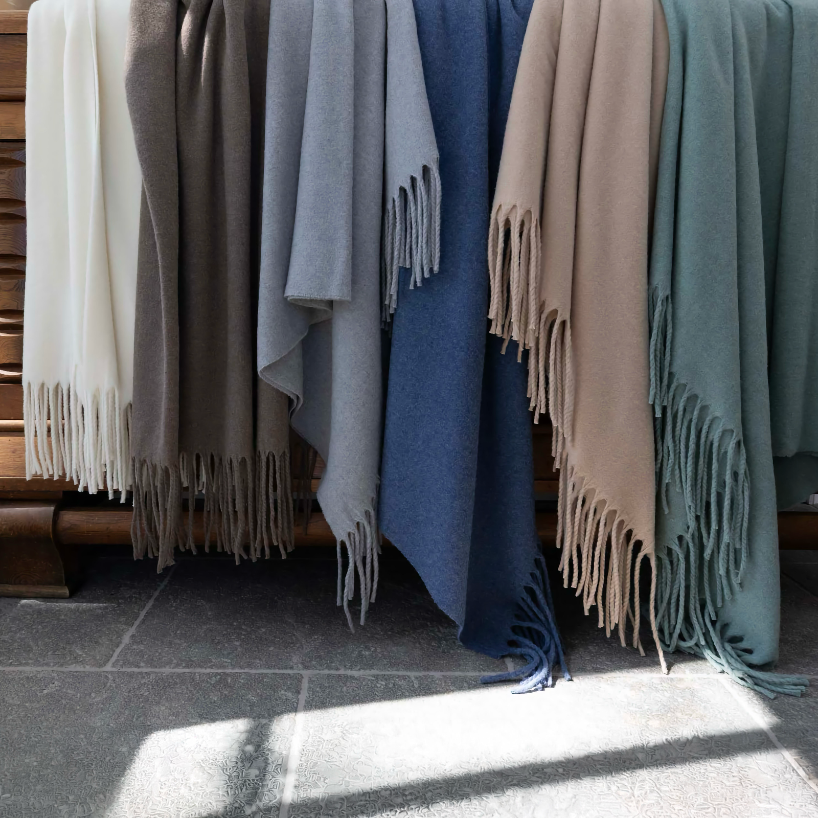 Collection of Scandia Home Pietro Throws with fringes