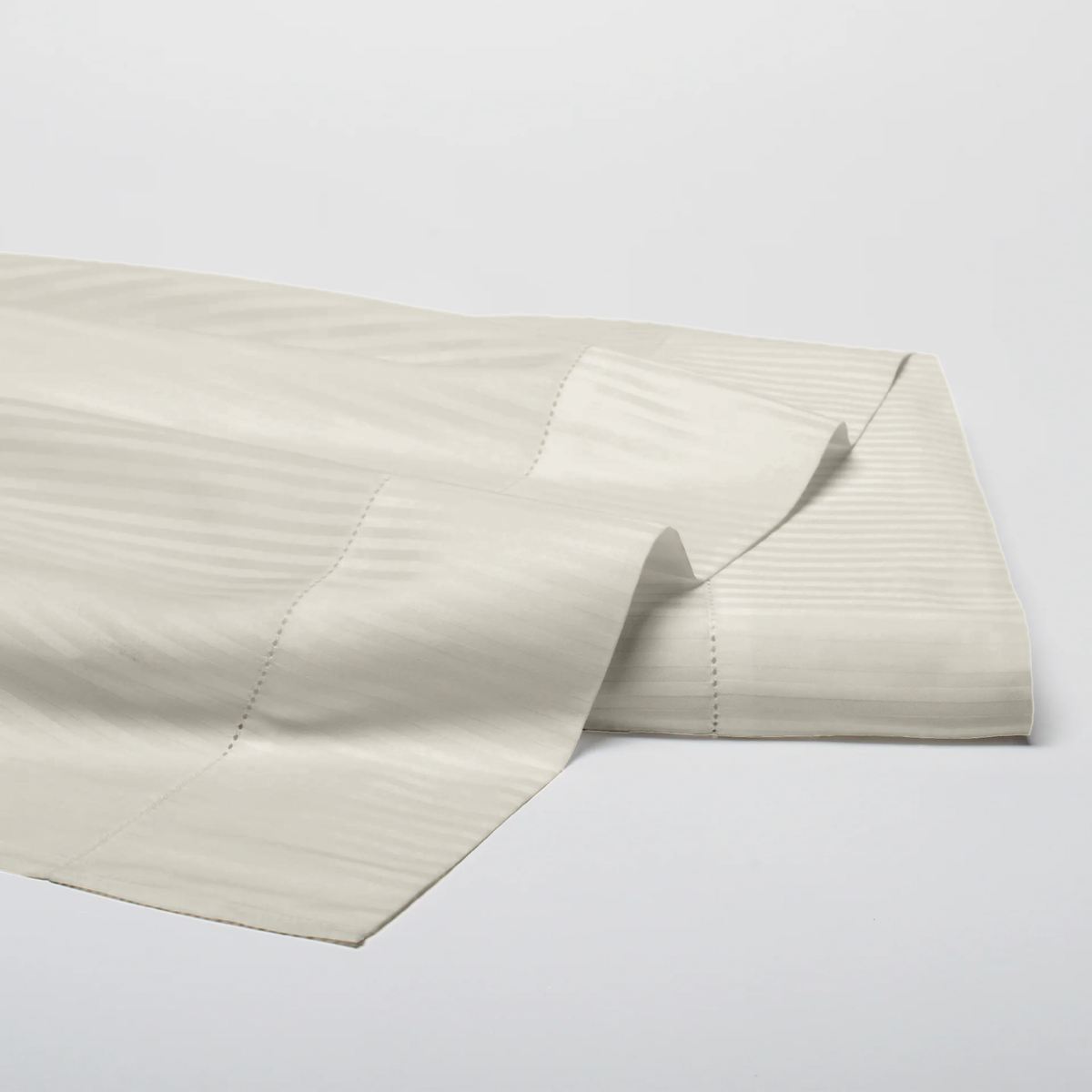 Folded Flat Sheet of Ivory Scandia Home Savoia Bedding Collection