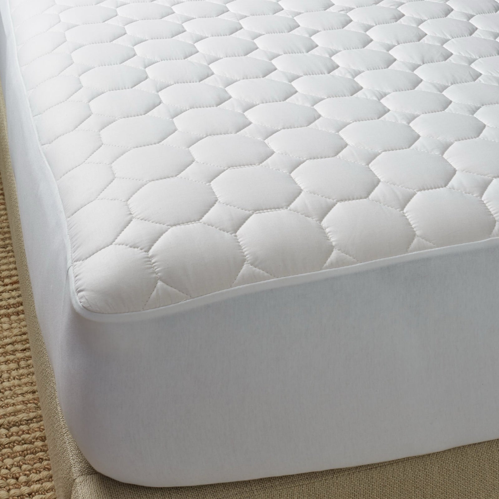 Corner of Mattress with White Scandia Home Sonatina Mattress Pad