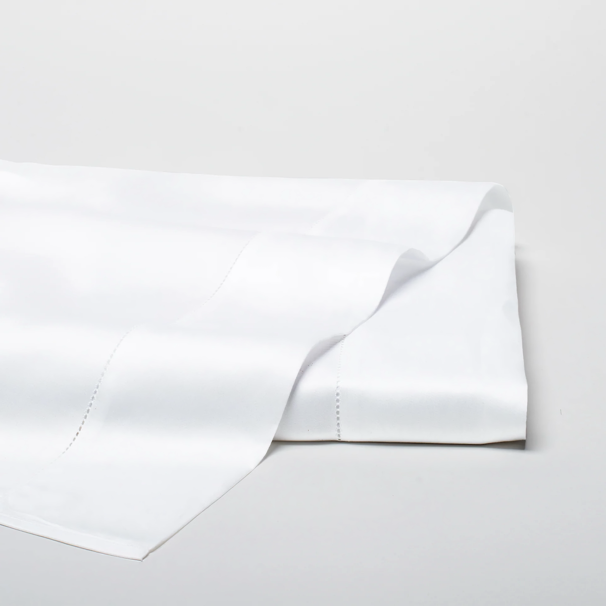 Folded Flat Sheet of White Scandia Home Stresa Bedding