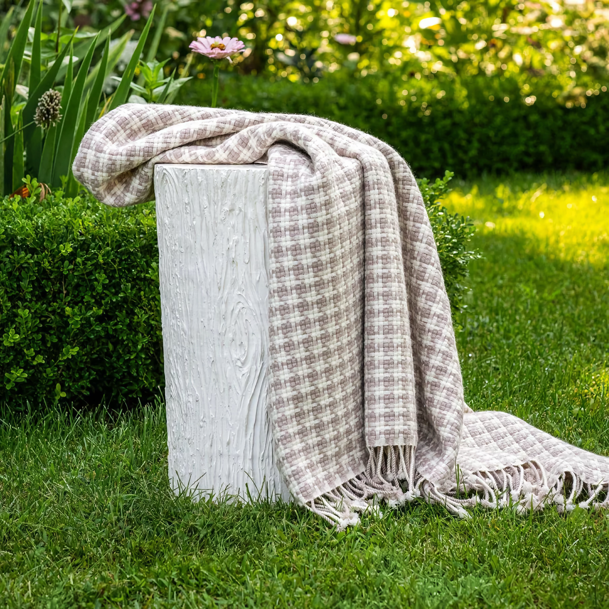 Scandia Home Torcello Throw in a garden