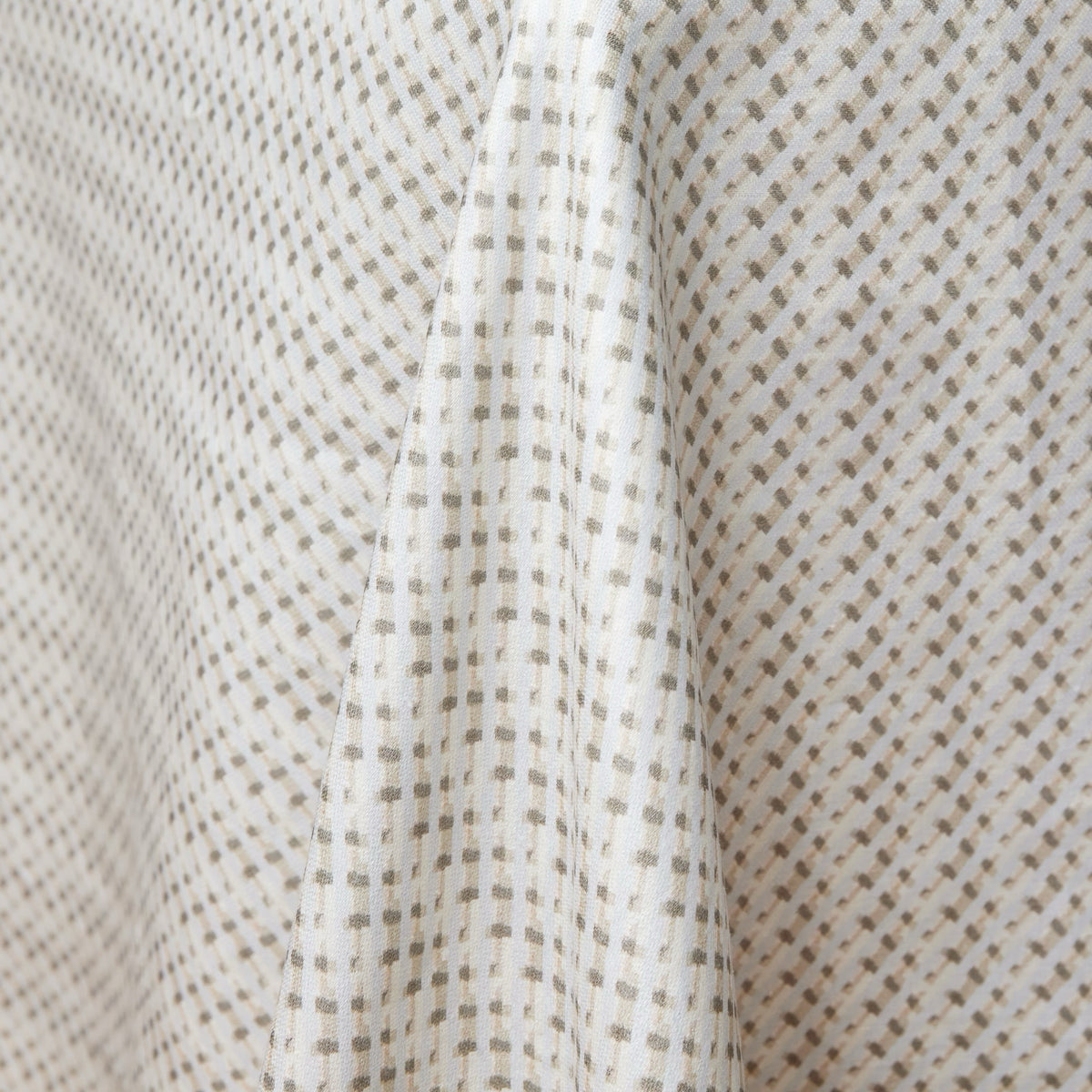 Corner View of Sferra Abruzzo Table Cloth in Natural