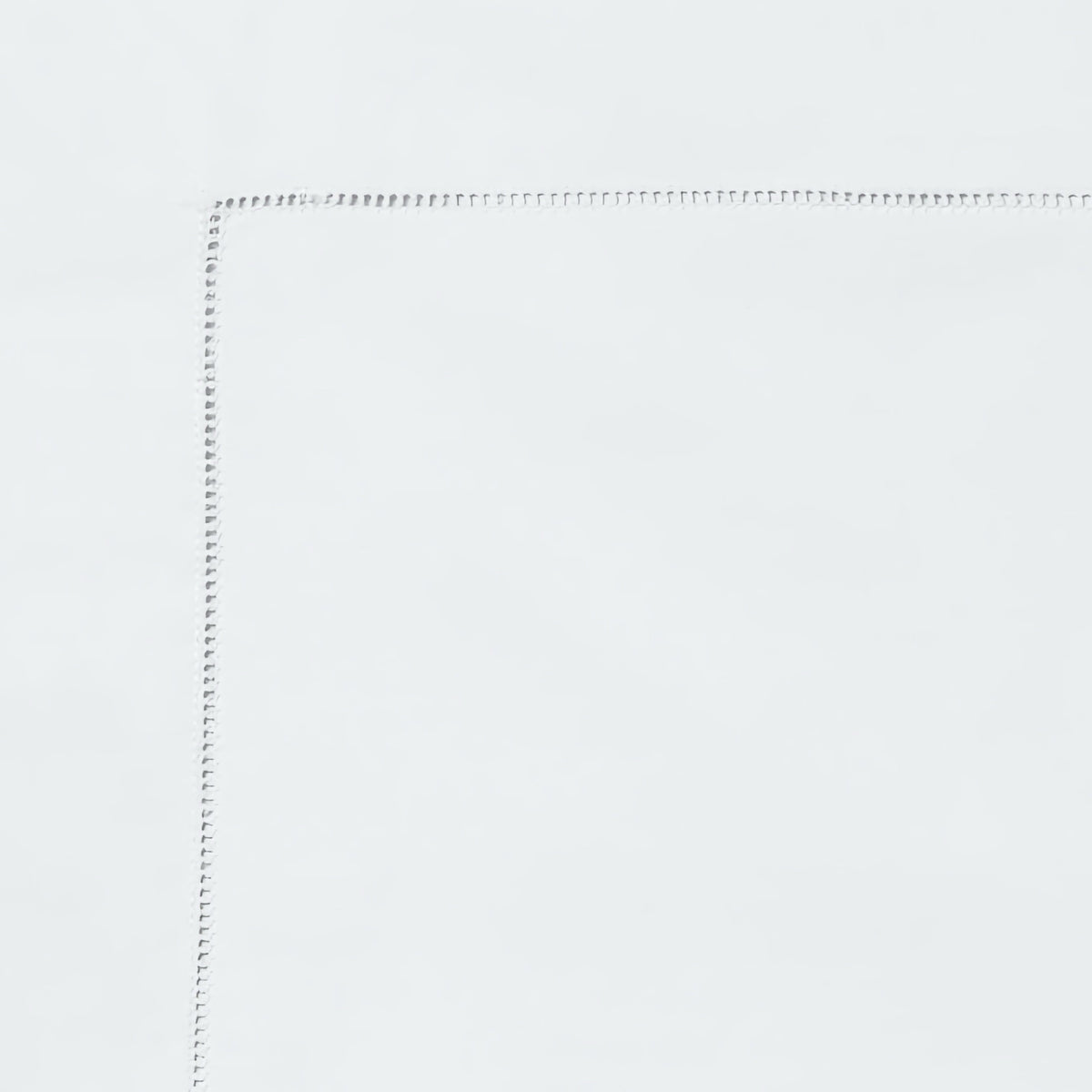 Swatch of Sferra Comfort Sleeper Bedding in White