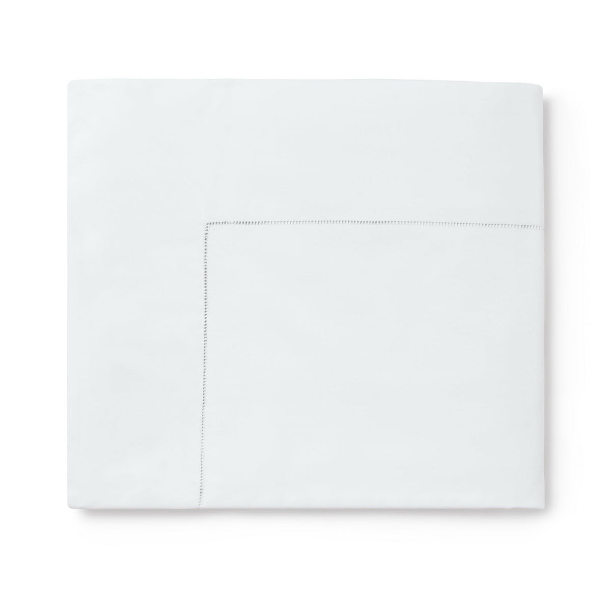 Folded Flat Sheet of Sferra Comfort Sleeper Bedding in White