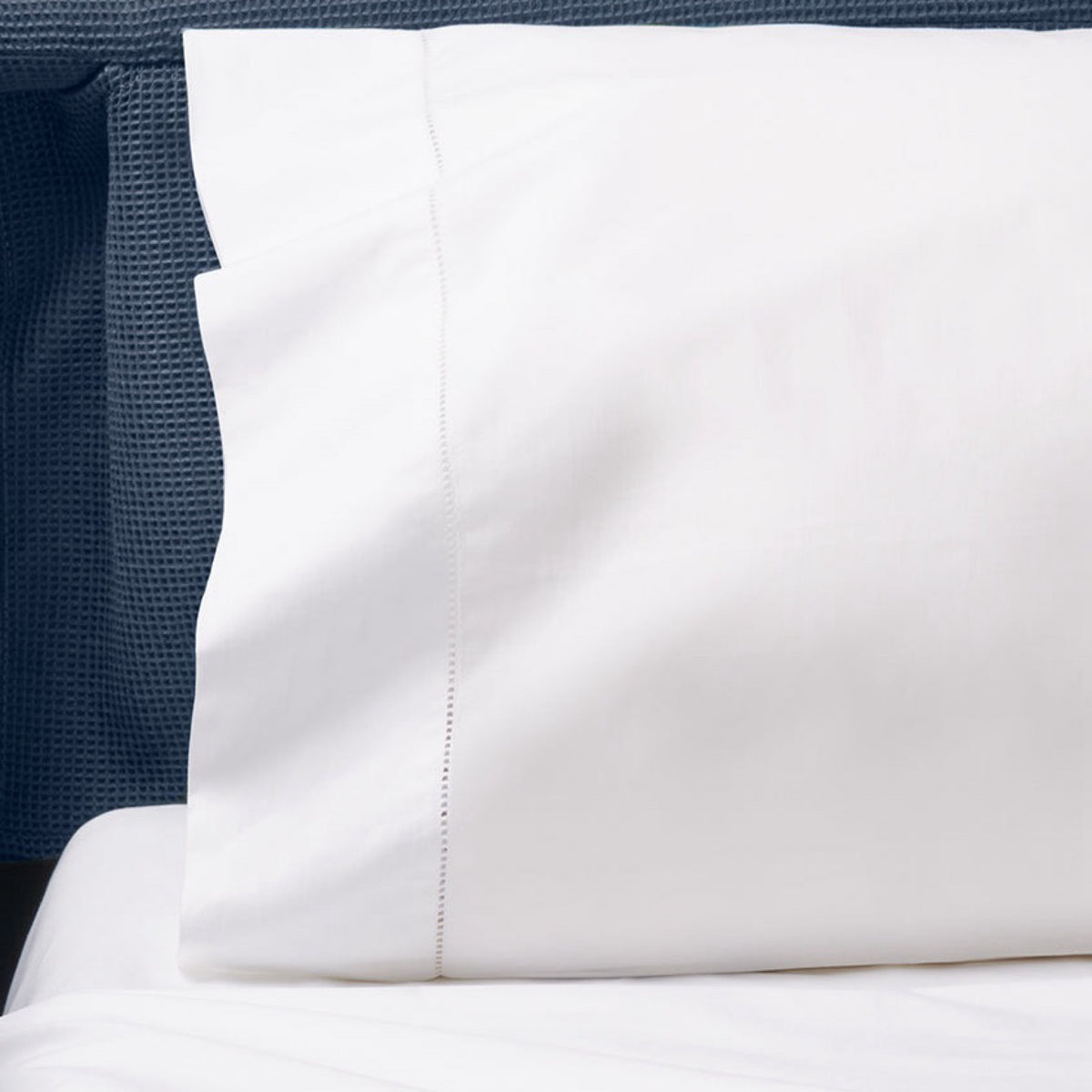 Closeup of Sferra Comfort Sleeper Pillowcase in White