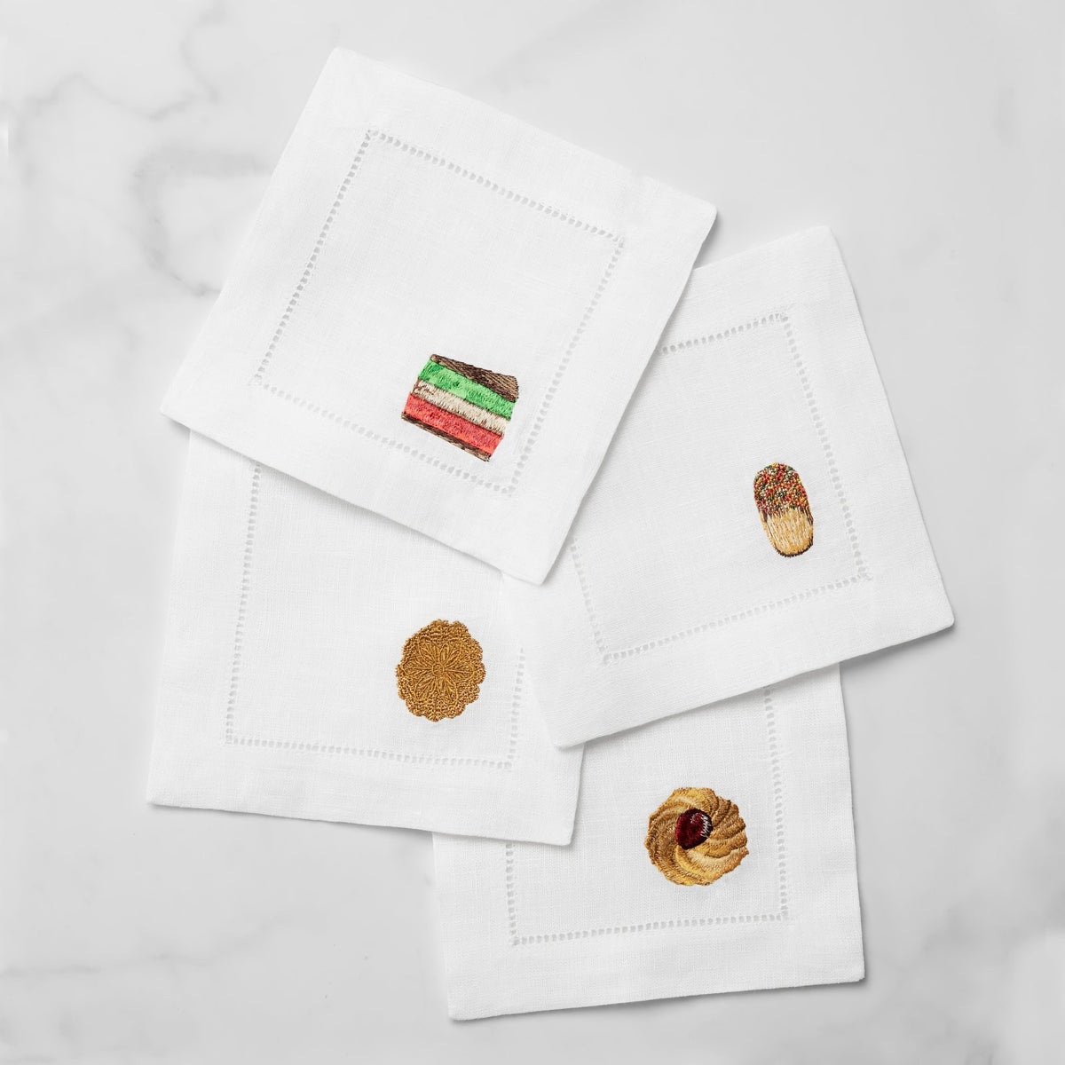 Stack of Sferra Biscotto Cocktail Napkins