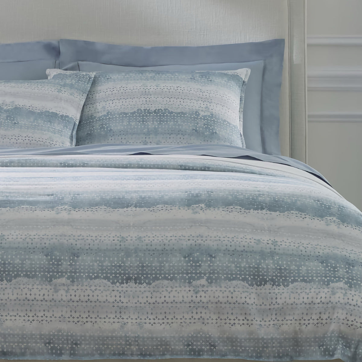 Front view of Sferra Brillanti Duvet Cover and Shams in Sky color
