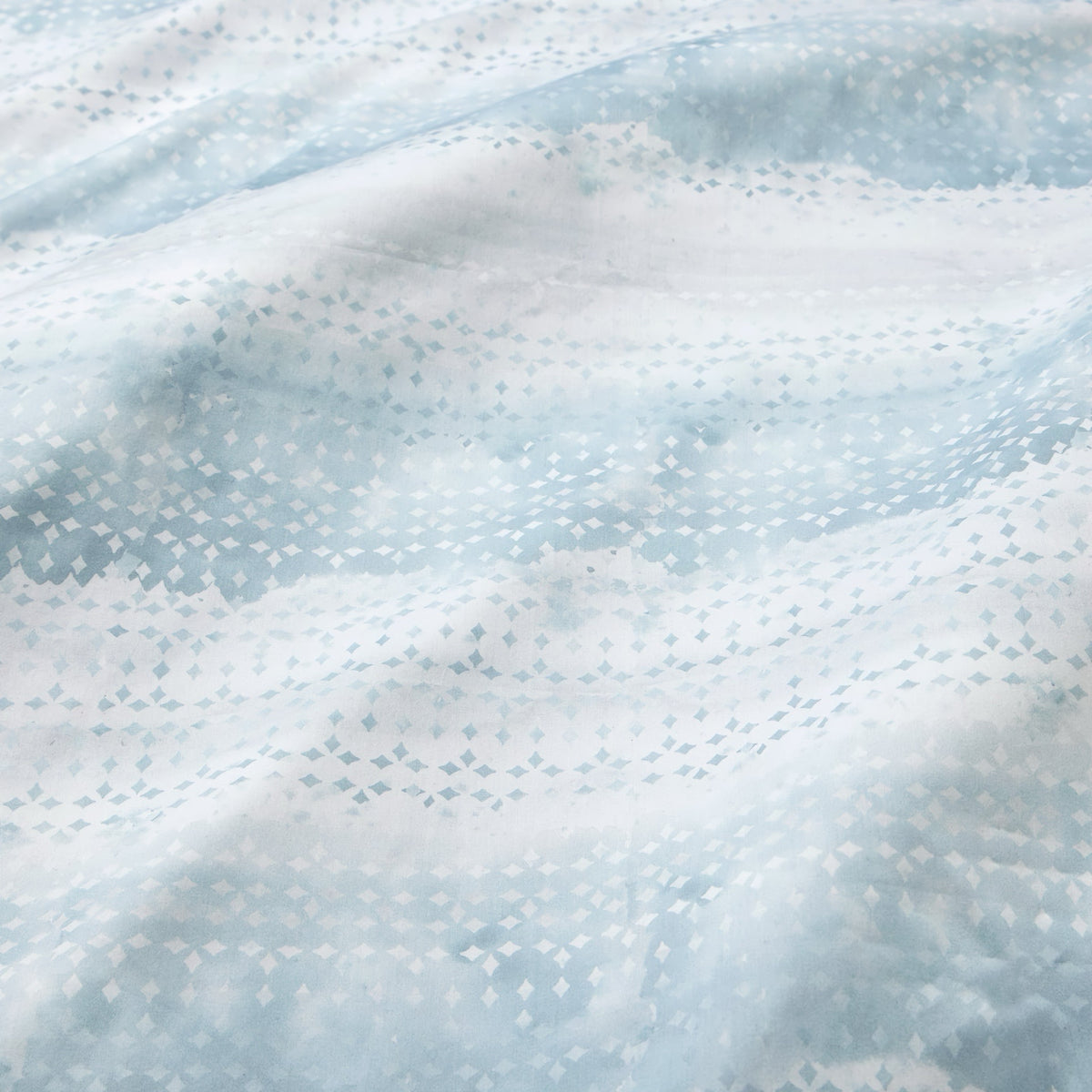 Fabric of Sferra Brillanti Duvet Cover and Shams in Sky color