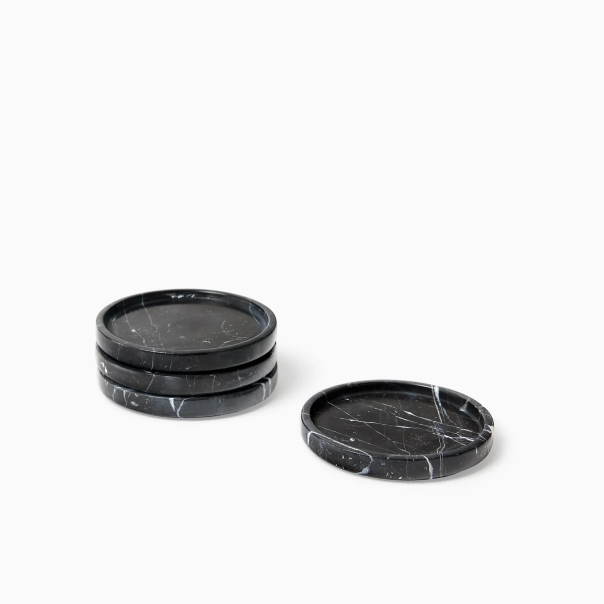 A Set of Black Sferra Calanna Coasters