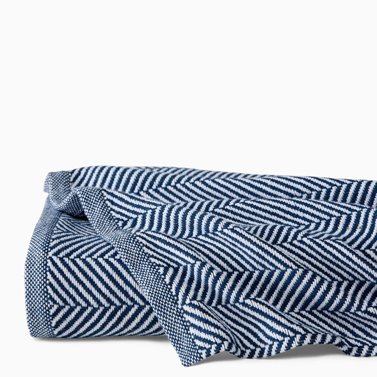 Folded Sferra Camilo Blanket in White/Navy