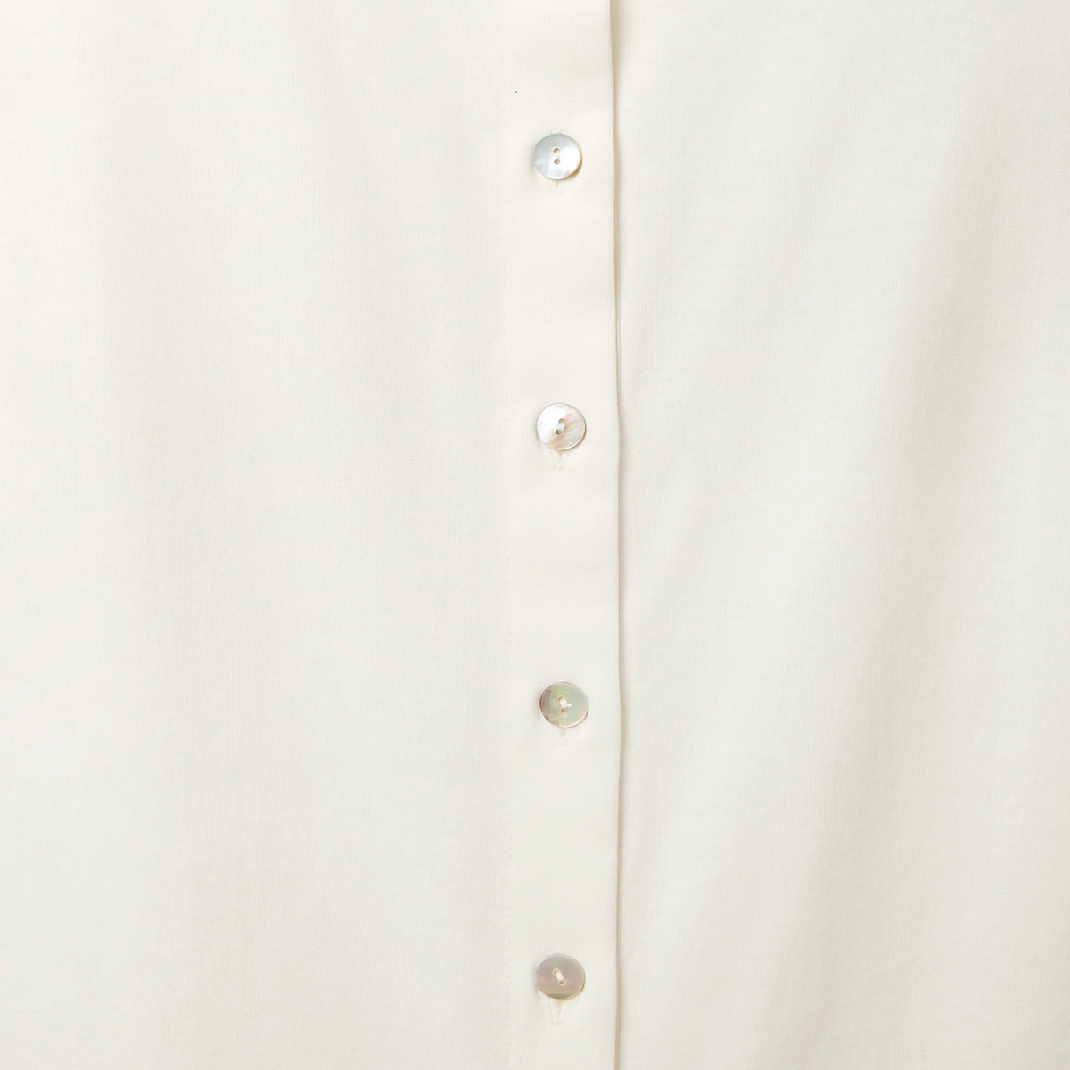 Buttons Closeup of Ivory Sferra Caricia Buttoned Tank Top