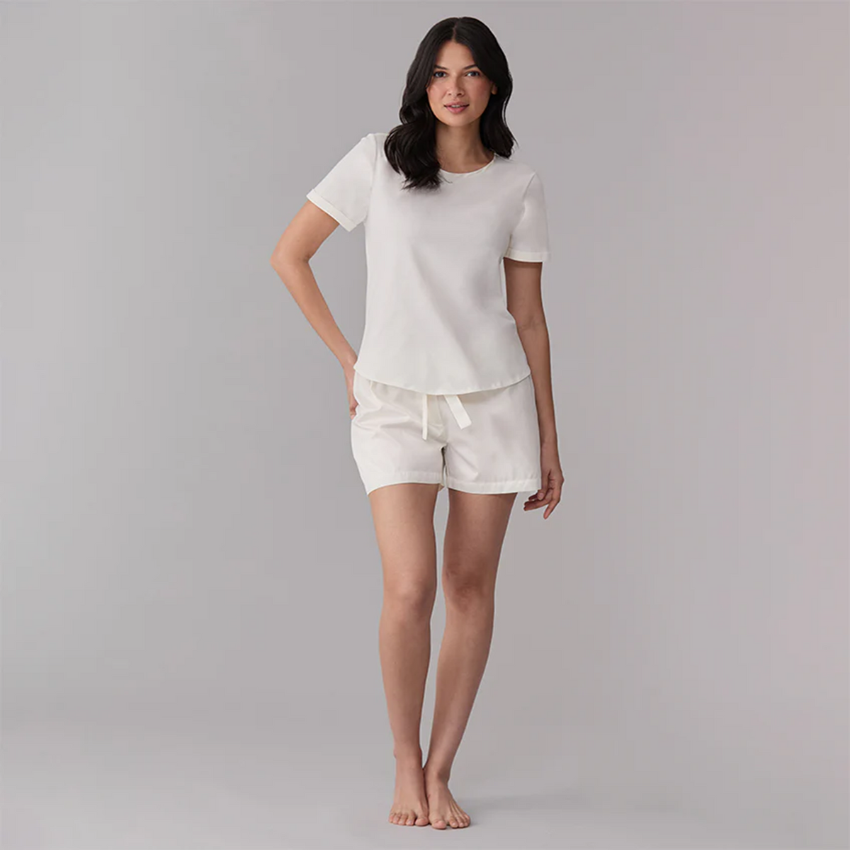 Model Wearing an Ivory Sferra Caricia Swing Short Sleeve Top and Pajama Short