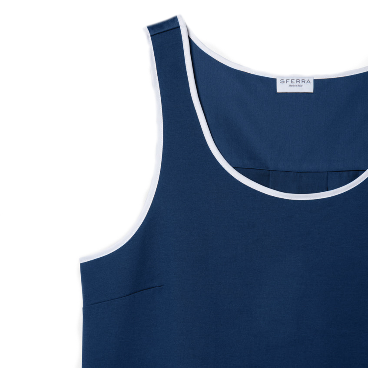 Corner View of Navy Sferra Caricia Swing Tank Top against a white background