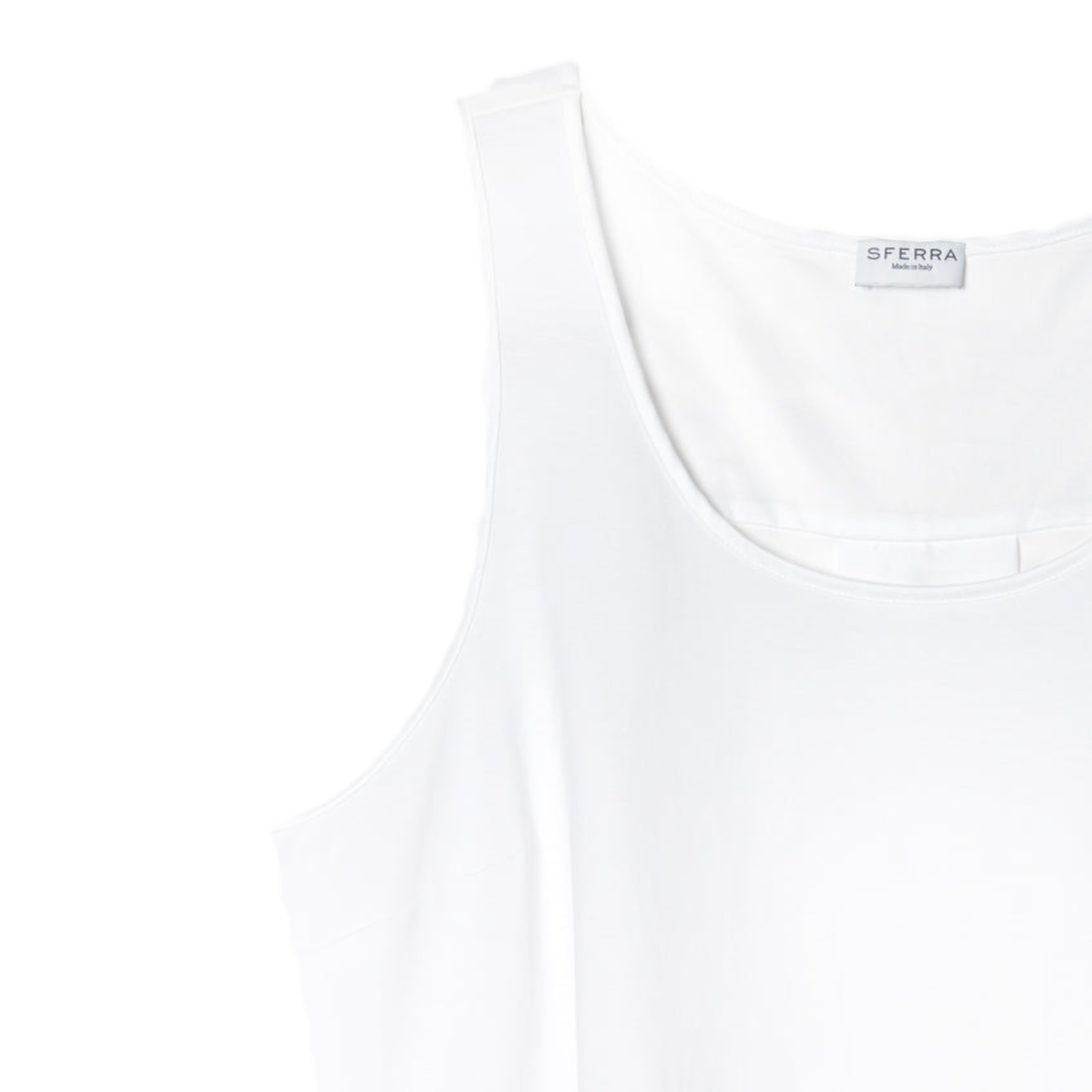 Corner View of White Sferra Caricia Swing Tank Top against a white background