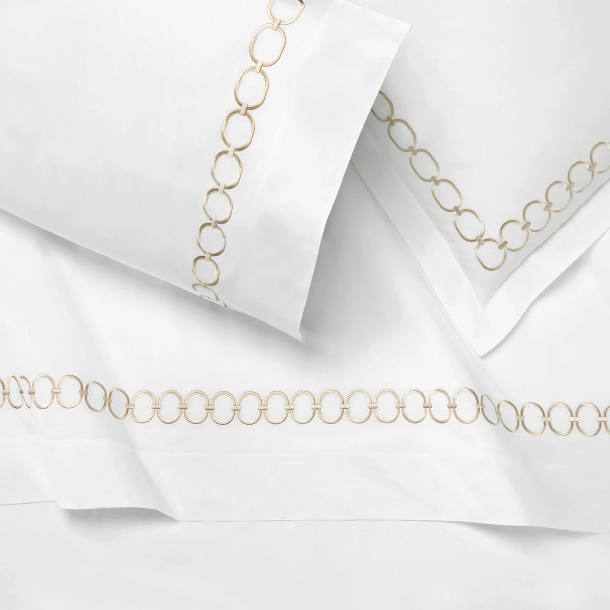 Close Up Shot of Folded Duvet Cover of Sferra Catena Bedding in Color White/Sand