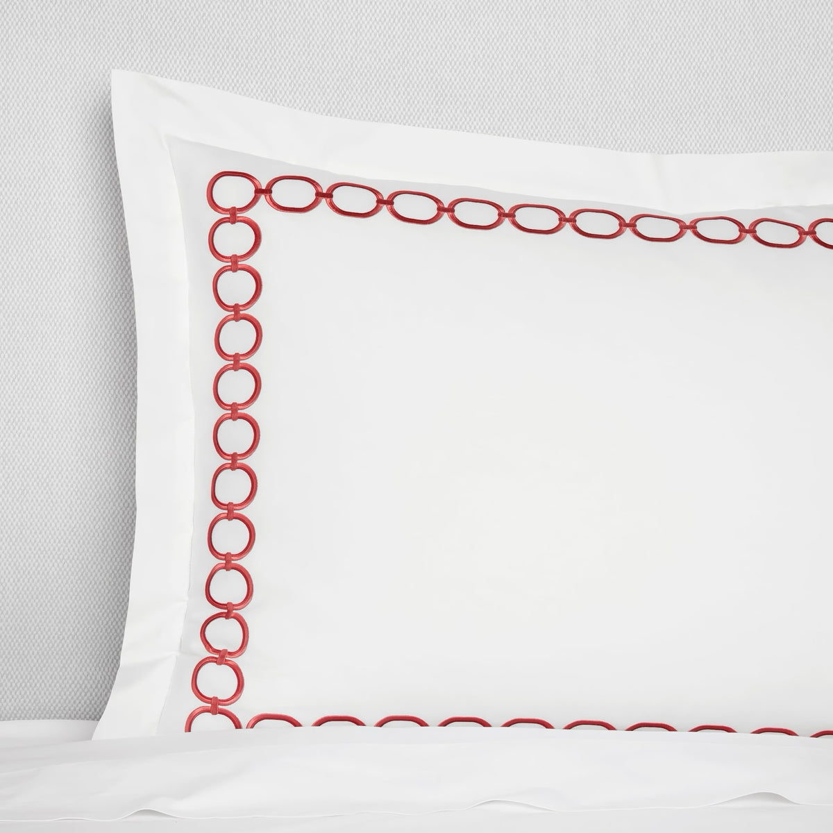 Closeup of Sferra Catena Bedding Sham in White/Persimmon