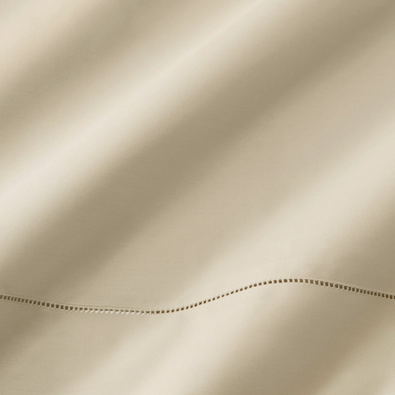 Bed Dressed in Sferra Celeste Bedding Collection with Swatch in Color Sand