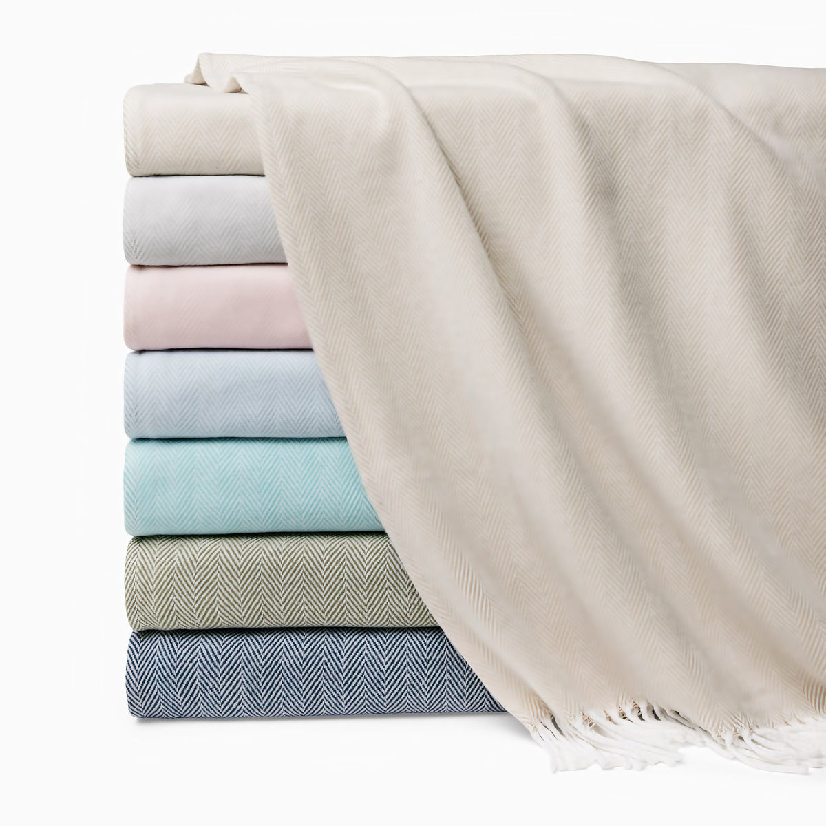Stack of Sferra Celine Throw Blankets in 2026 colors