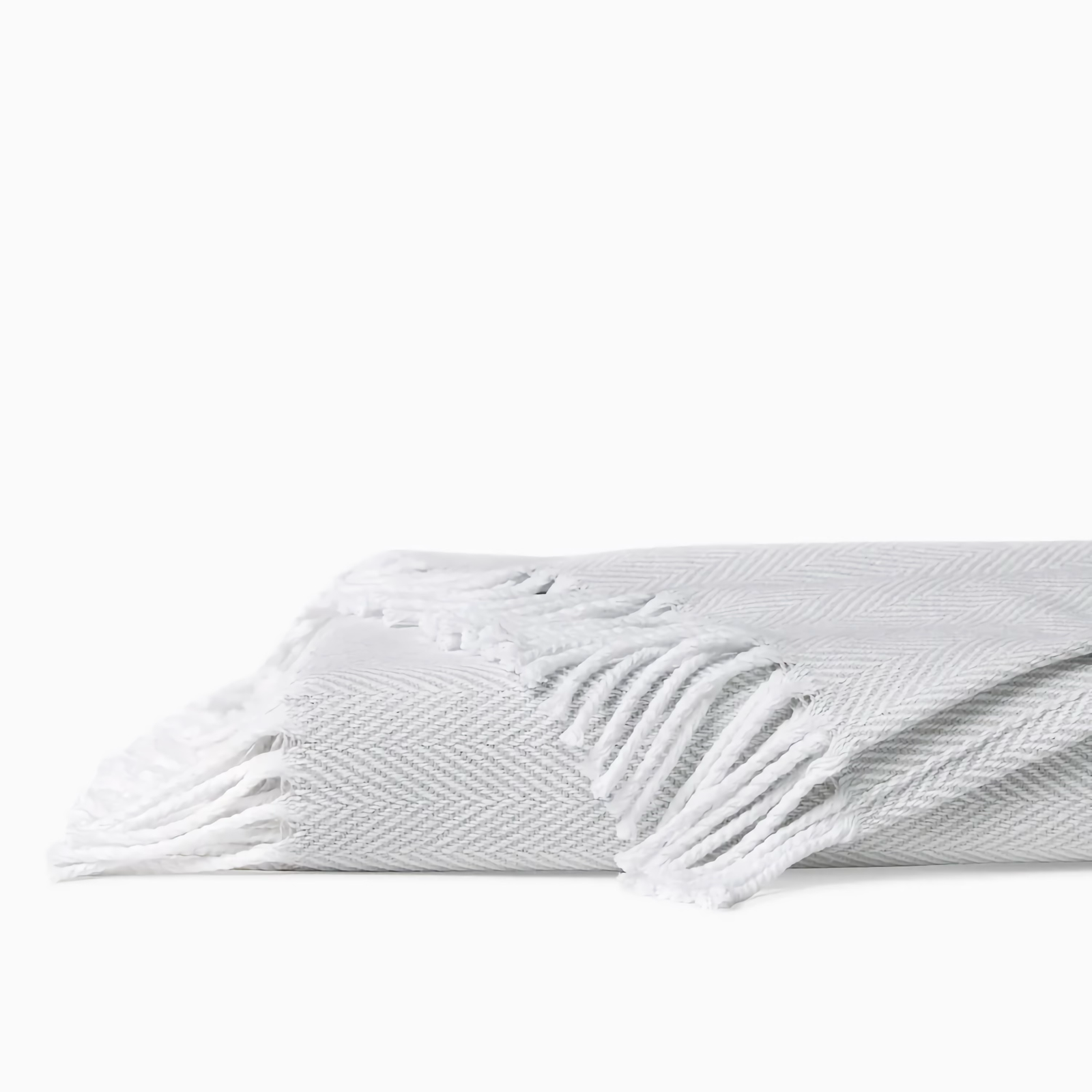 Folded Sferra Celine Throw Blanket in White and Lunar