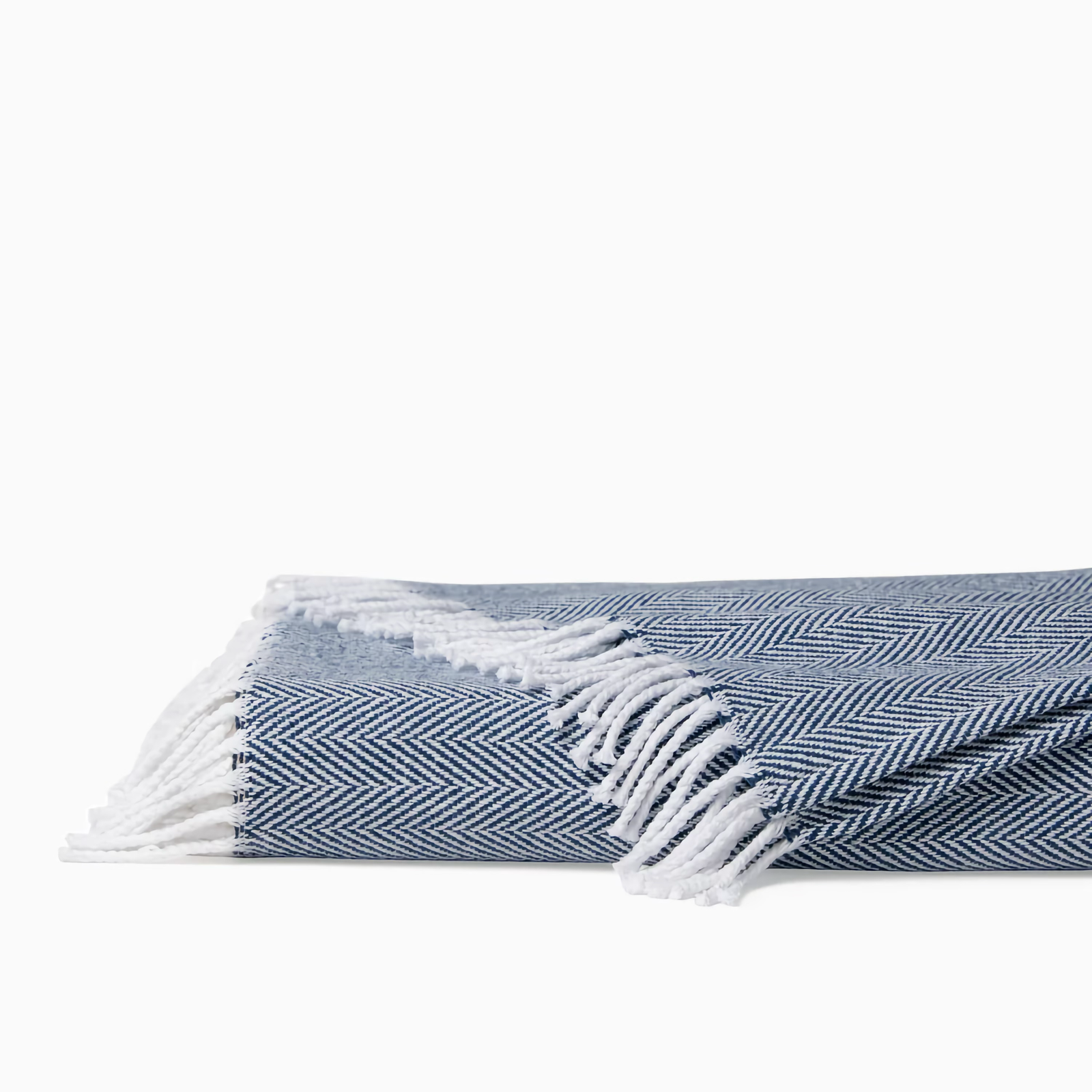 Folded Sferra Celine Throw Blanket in White and Navy