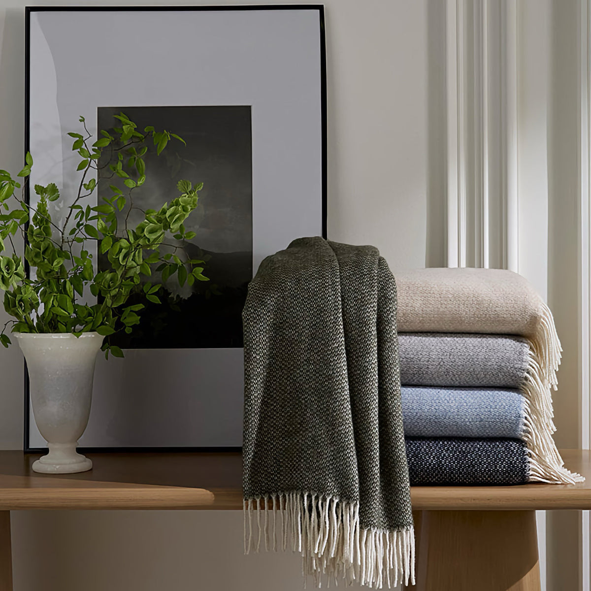 Stack of Sferra Cervino Throws with fringes showing 