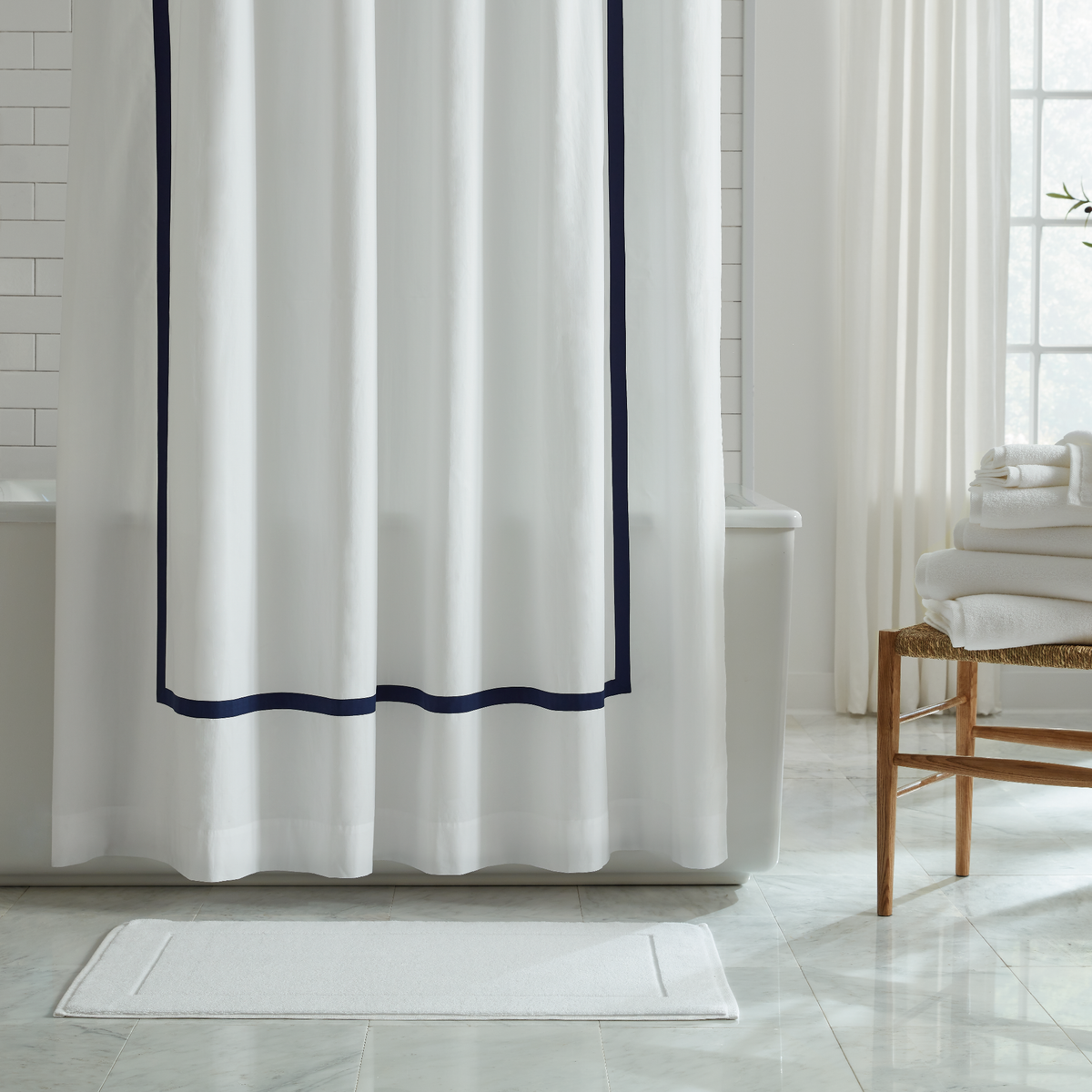 Sferra Cielo Bath Collection Featuring a White Tub Mat on Floor 