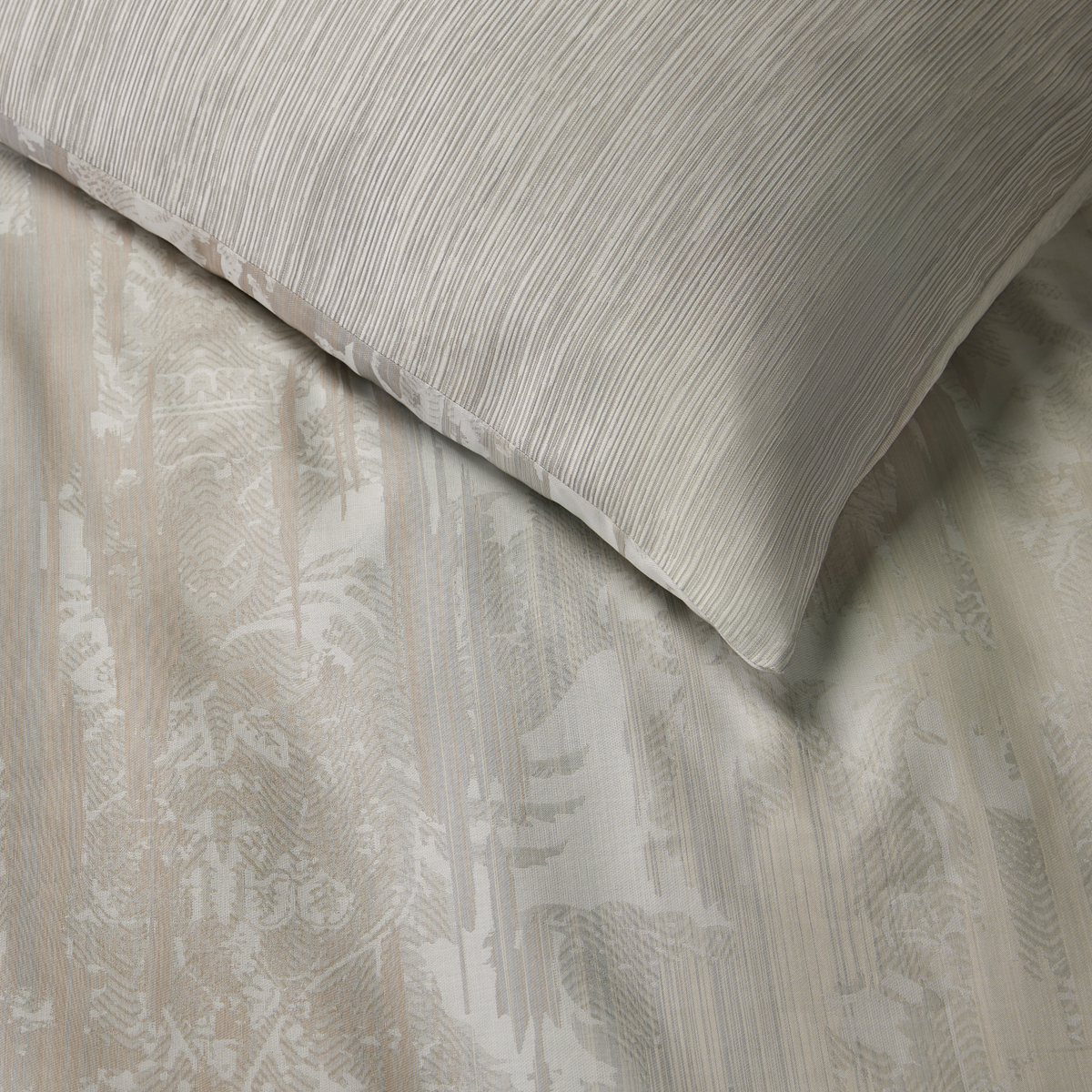 Closeup Shot of Sferra Cloister Bedding in Fog Color