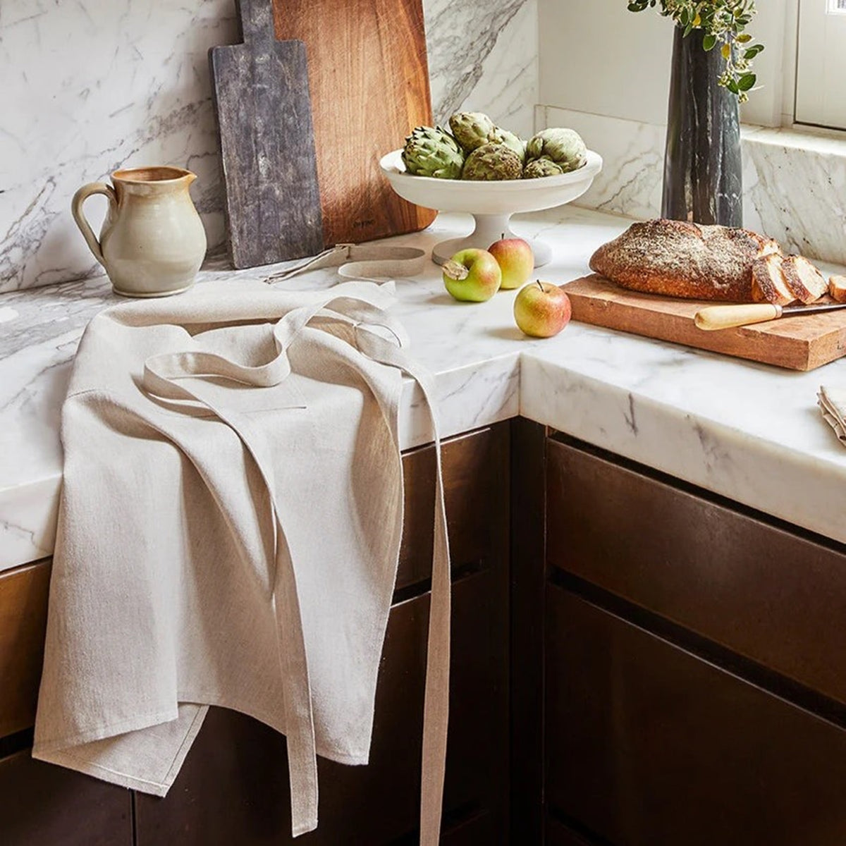 Lifestyle Shot of Sferra Cucina Apron in Natural Color