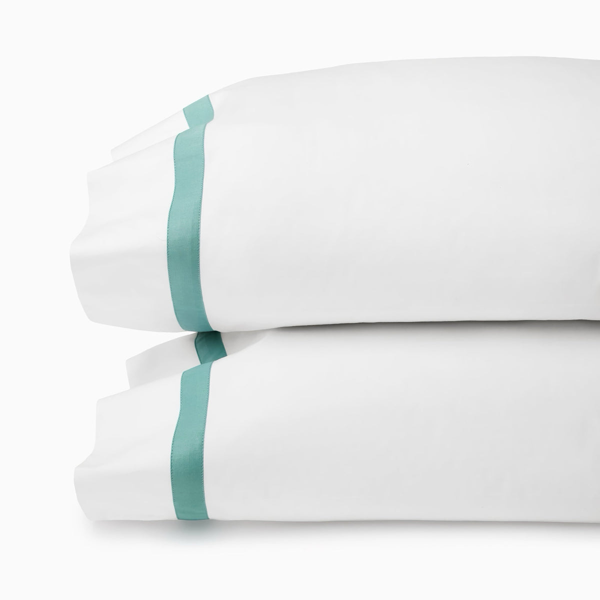 Pillowcases of Sferra Estate Bedding in White and Aqua color