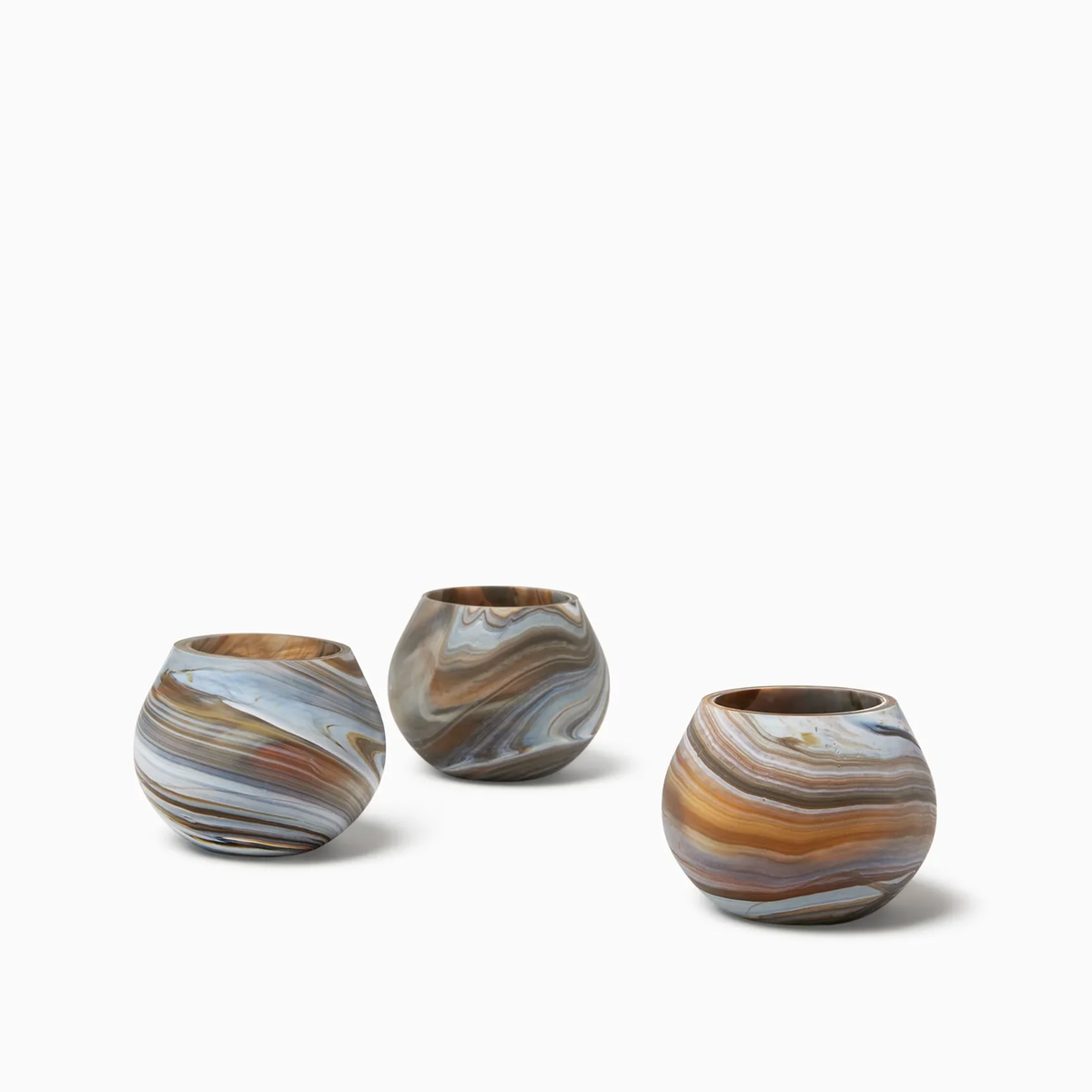 Three round, Bark Sferra Giove Marbled Votive Holders, perfect as bespoke glass accessories for your decor