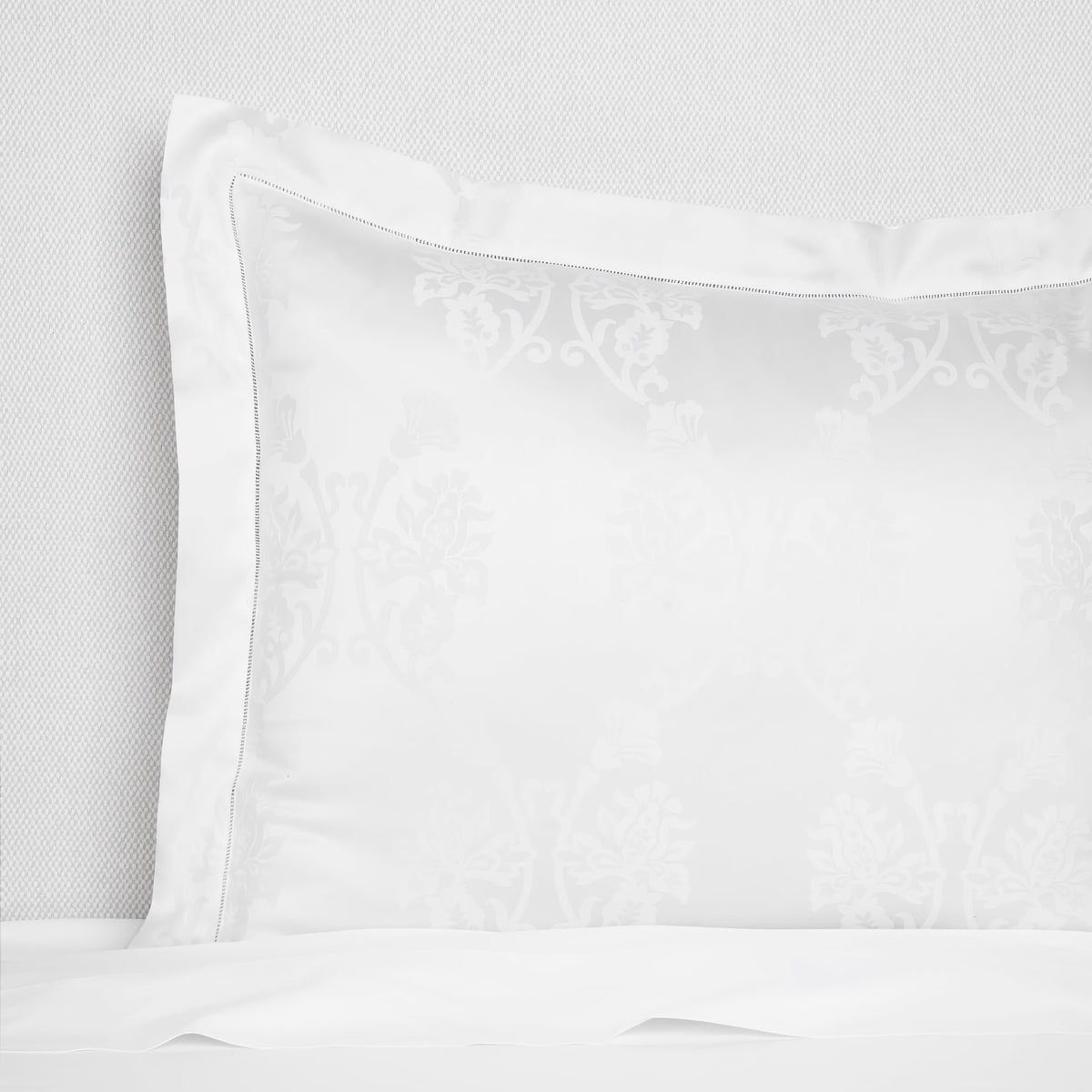 Sham Closeup of White Sferra Giza 45 Lido Bedding