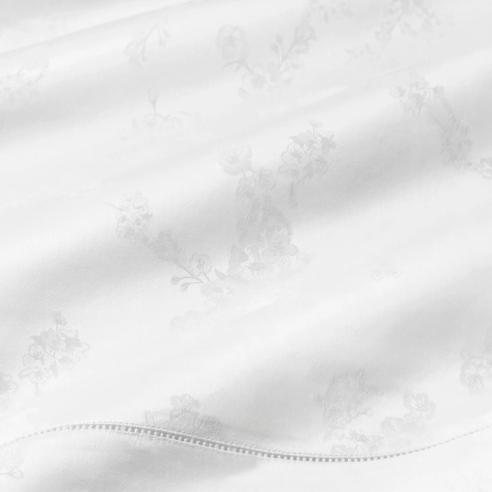 Bed Dressed in Sferra Giza 45 Natura Bedding in White Color